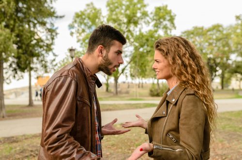couple arguing in a park