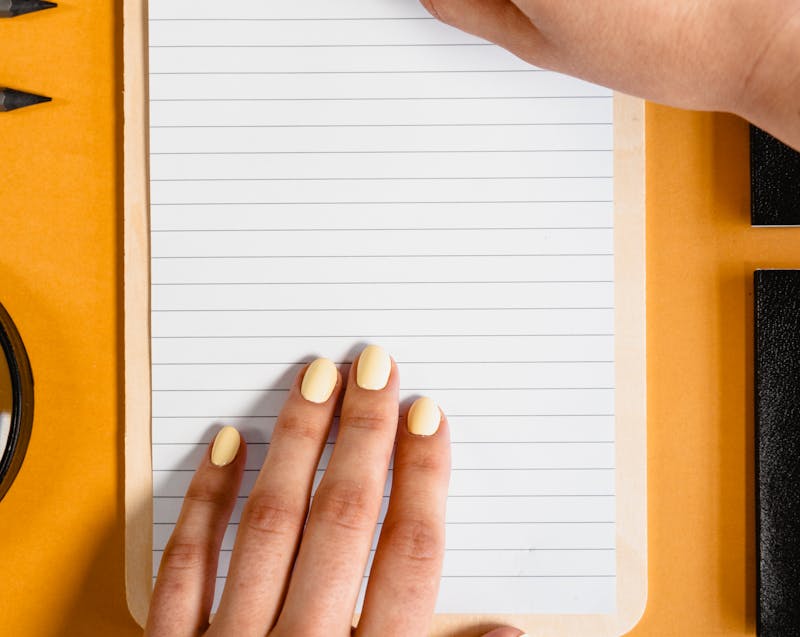 a piece of paper and pens